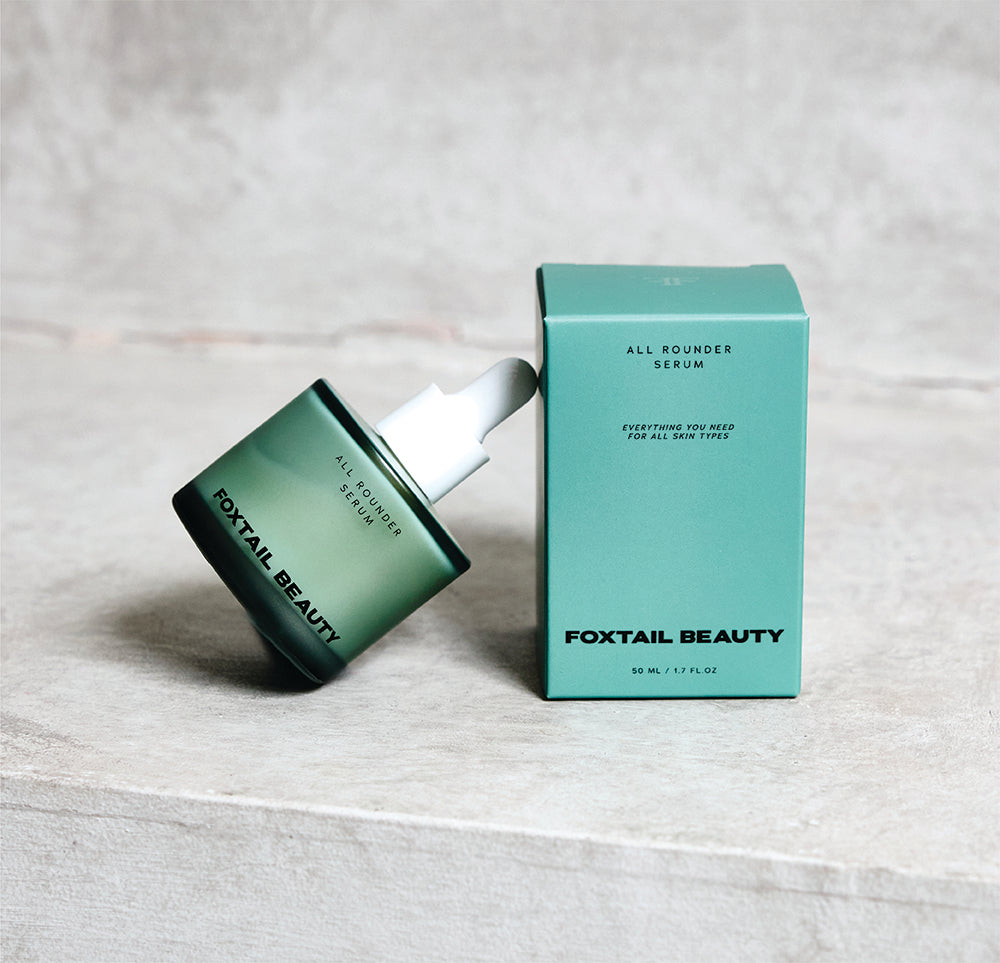 Foxtail Beauty All Rounder Serum for barrier repair hydrating serum with packaging on a light gray background