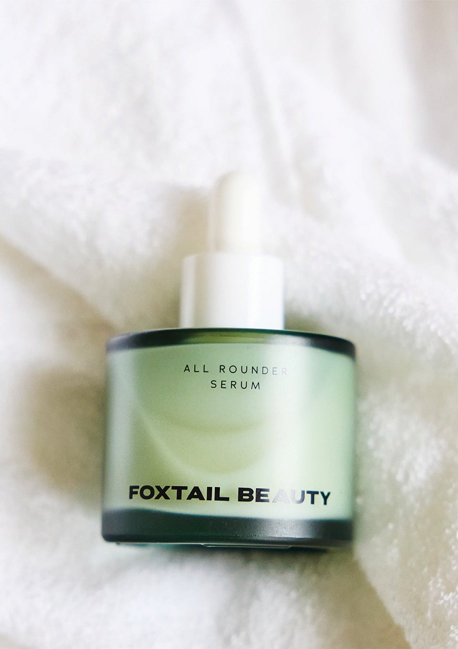 Foxtail Beauty All Rounder Serum on white towel — minimal skincare routine for effortless glow